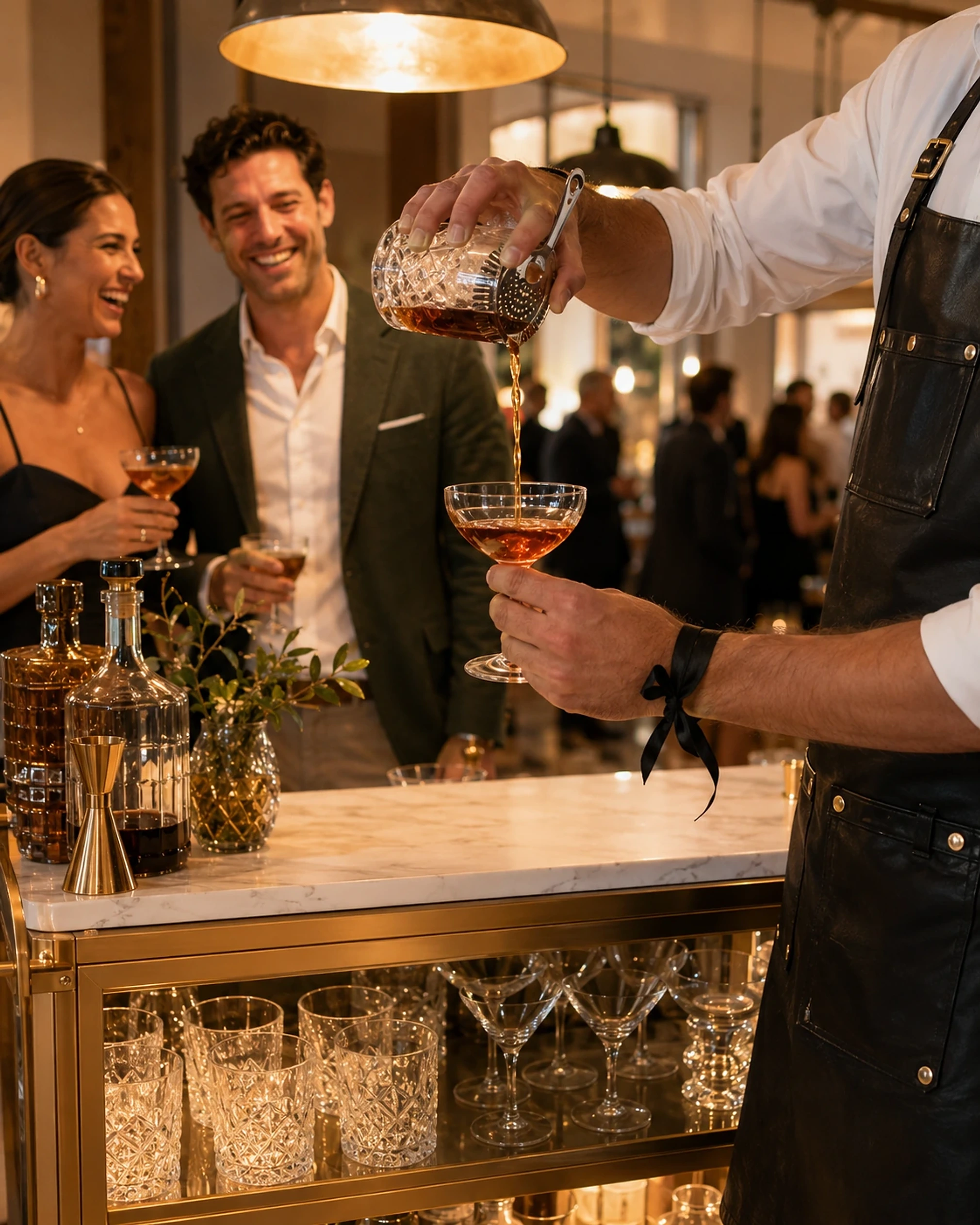 Premium cocktail glasses on a polished dark wood bar